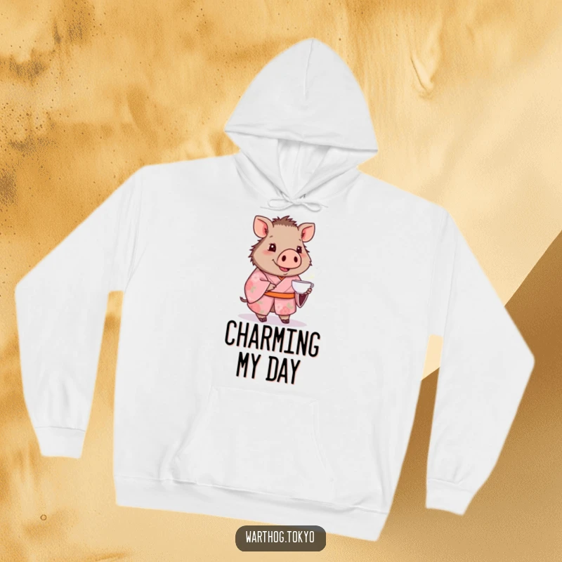 Funny cozy hoodie featuring a warthog in a pink floral kimono offering a teacup, ideal for a warm, funny gift.
